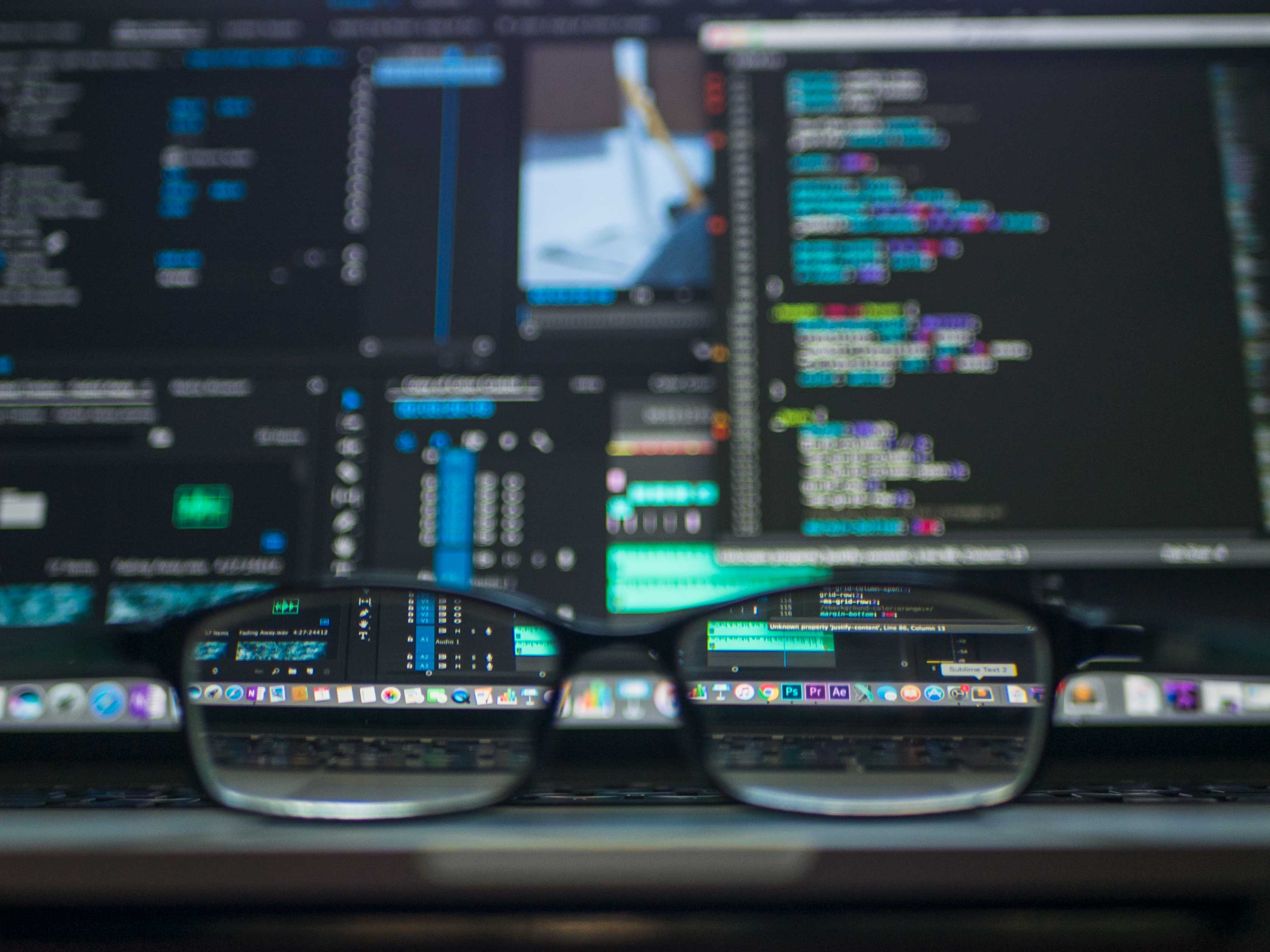 Computer Screen with glasses in front